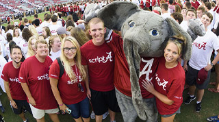 Alabama fans standing with Big Al